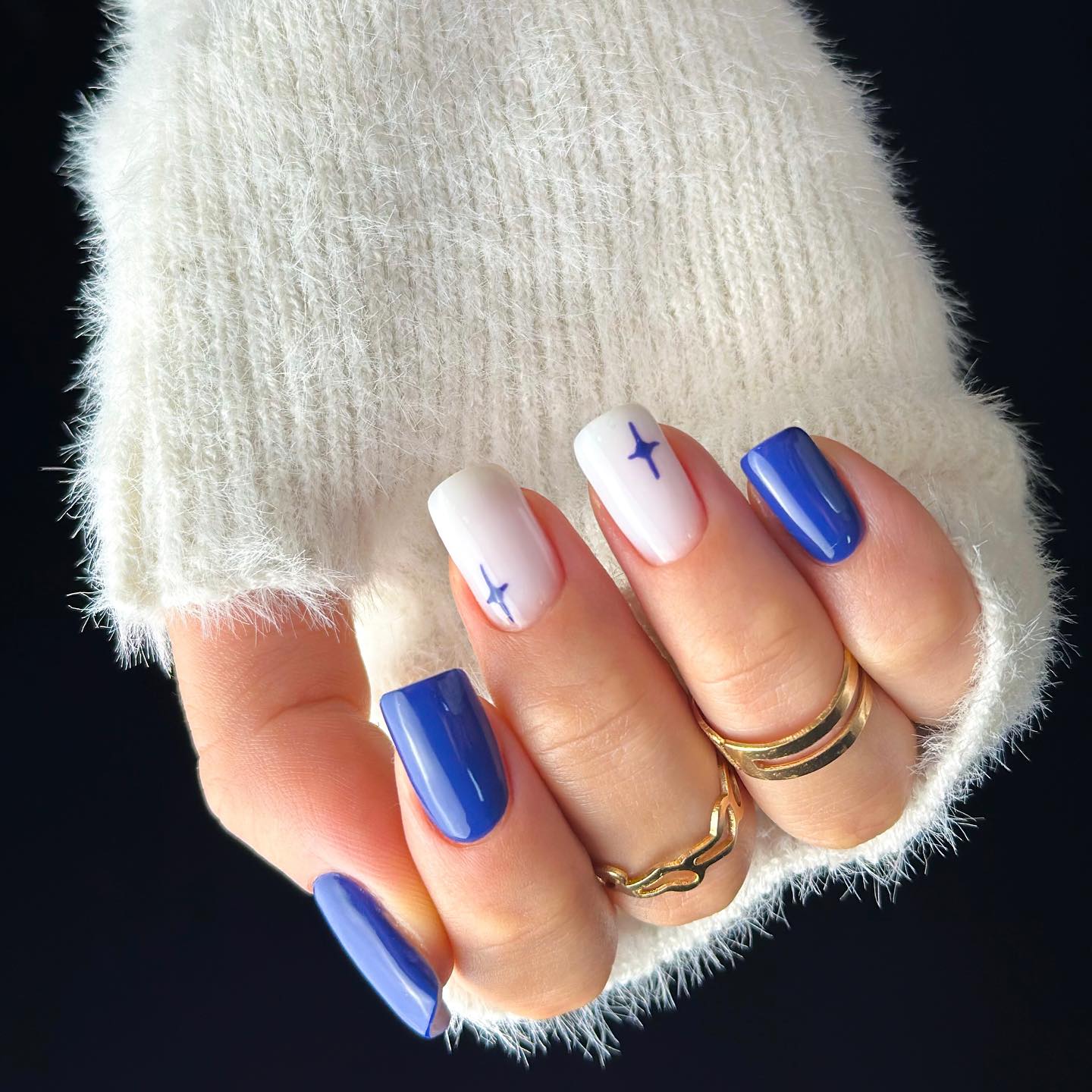 Cobalt blue nails with star accents